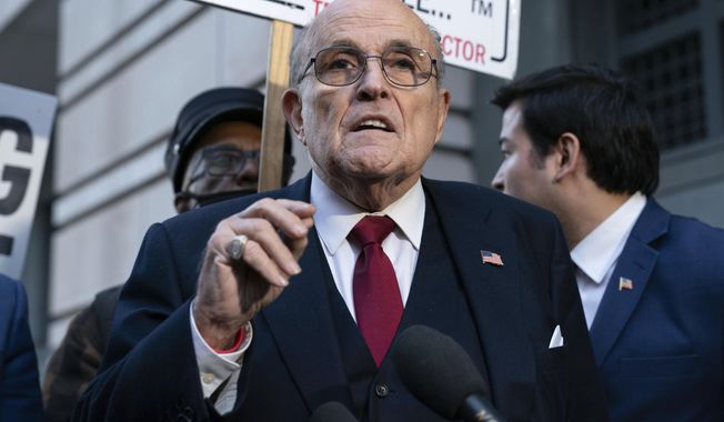 Former Mayor of New York Rudy Giuliani speaks during a news conference outside the federal courthouse in Washington, Dec. 15, 2023. Guiliani, a lawyer for former President Donald Trump, was among those indicted Wednesday, April 24, 2024, in an Arizona election interference case.(AP Photo/Jose Luis Magana, File)