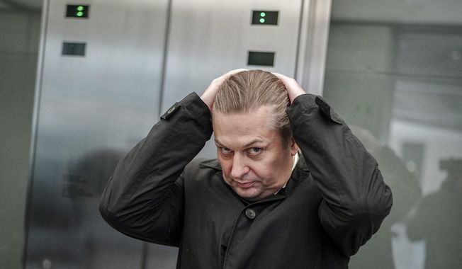 Maximilian Krah, AfD lead candidate for the European elections, stands in the elevator in the Bundestag after a meeting with the AfD parliamentary group leadership, Wednesday, April 24, 2024, in Berlin.. One of Krah&#x27;s employees is suspected of spying for China. (Kay Nietfeld/dpa via AP)