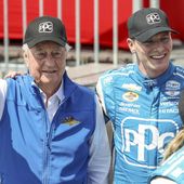 Team Penske driver Josef Newgarden, right, celebrates his victory with team owner Roger Penske after the IndyCar Grand Prix of St. Petersburg auto race, Sunday, March 10, 2024, in St. Petersburg, Fla. Team Penske suffered a humiliating disqualification Wednesday, April 24, when reigning Indianapolis 500 winner Josef Newgarden was stripped of his victory in the season-opening race for manipulating his push-to-pass system. Penske teammate Scott McLaughlin, who finished third in the opener on the downtown streets of St. Petersburg, Florida, was also disqualified. (AP Photo/Mike Carlson, File)
