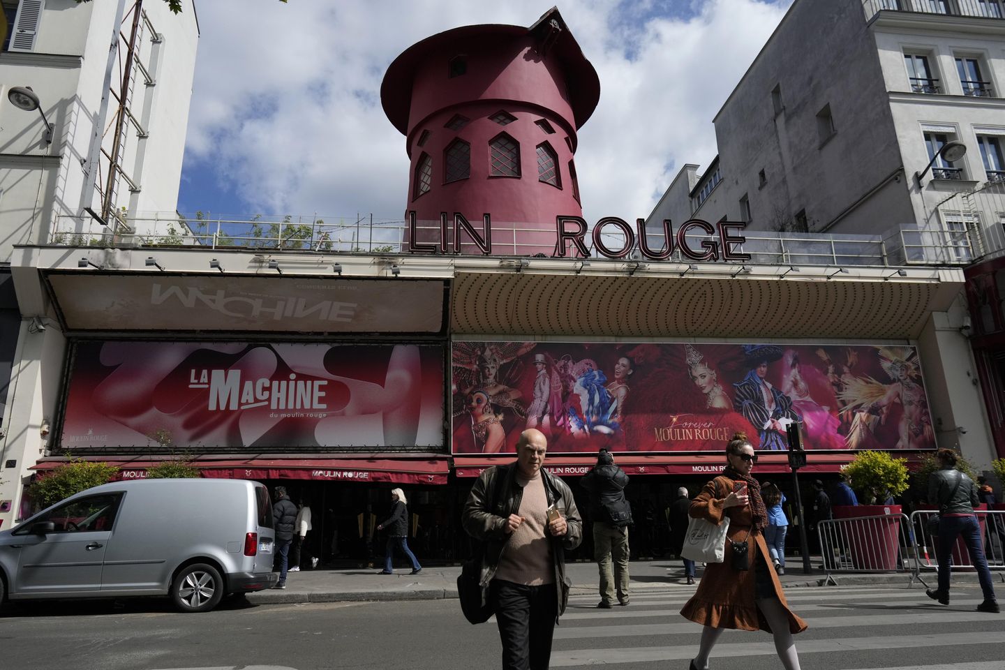 Moulin Rouge's four windmill blades fall off the iconic Parisian club; none injured
