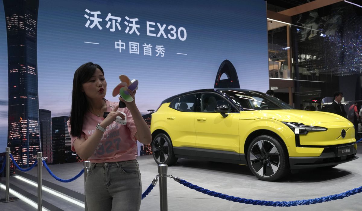 NextImg:Biden administration plans to impose major new tariffs on EVs, other Chinese green energy imports