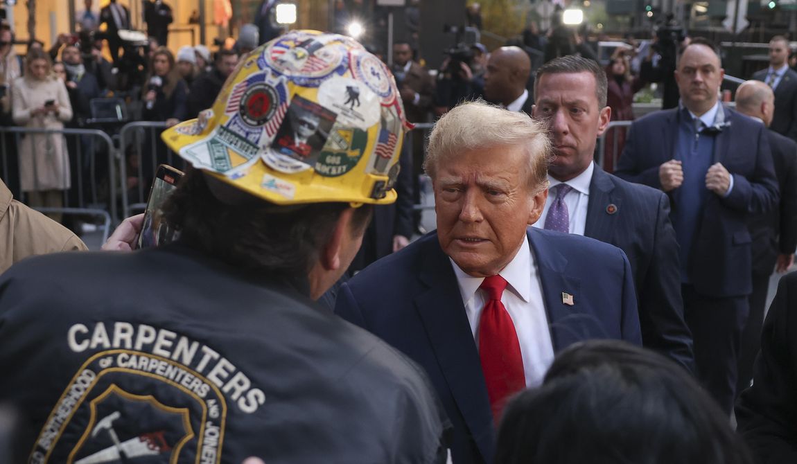 Former President Donald Trump speaks with construction workers at the construction site of the new JPMorgan Chase headquarters in midtown Manhattan, Thursday, April 25, 2024, in New York. Trump met with construction workers and union representatives hours before he&#x27;s set to appear in court. (AP Photo/Yuki Iwamura)