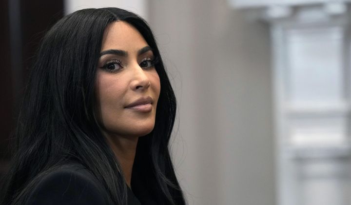 Kim Kardashian listens during a discussion in the Roosevelt Room of the White House in Washington, Thursday, April 25, 2024, on criminal justice reform and the pardons issued by President Joe Biden earlier this month. (AP Photo/Susan Walsh)