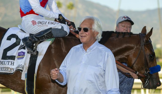FILE - In this image provided by Benoit Photo, trainer Bob Baffert smiles after Muth (2), with Juan Hernandez aboard, won the Grade I $300,000 American Pharoah Stakes horse race Saturday, Oct. 7, 2023 at Santa Anita Park in Arcadia, Calif. A Kentucky appeals court judge on Wednesday, April 24, 2024, has denied Zedan Racing Stables’ requests for an emergency hearing and ruling that sought to allow Bob Baffert-trained Arkansas Derby winner Muth to run in next week’s Kentucky Derby at Churchill Downs. (Benoit Photo via AP, File)