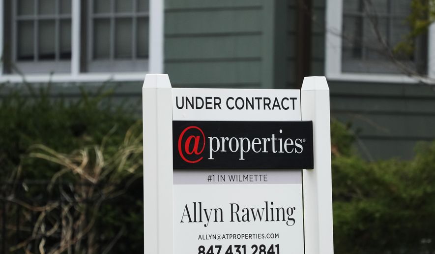 An &quot;Under Contract&quot; sign is displayed at a home in Wilmette, Ill., Thursday, March 28, 2024. On Thursday, April 25, 2024, Freddie Mac reports on this week’s average U.S. mortgage rates. (AP Photo/Nam Y. Huh)