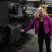 Secretary of the Army Christine Wormuth looks over the latest version of the M1A2 Abrams main battle tank as she tours the Joint Systems Manufacturing Center, Feb. 16, 2023, in Lima, Ohio. Two U.S. officials say Ukraine has sidelined U.S.-provided Abrams M1A1 battle tanks for now in its fight against Russia. This is in part because Russian drone warfare has made it too difficult for them to operate without detection or coming under attack. (AP Photo/Carlos Osorio, File)