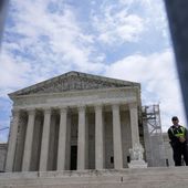 The Supreme Court is seen during a protest as the justices prepare to hear arguments over whether Donald Trump is immune from prosecution in a case charging him with plotting to overturn the results of the 2020 presidential election, on Capitol Hill Thursday, April 25, 2024, in Washington. (AP Photo/Mariam Zuhaib)