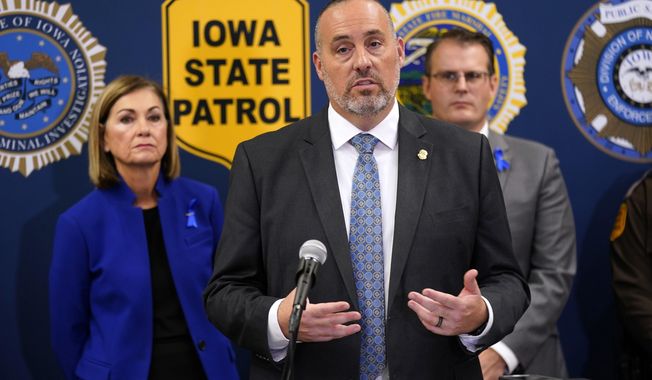 FILE - Iowa Dept. of Public Safety Commissioner Stephan Bayens speaks during a news conference about the Iowa National Guard and Iowa Department of Public Safety deployment to the southern border, Wednesday, Oct. 25, 2023, in Des Moines, Iowa. Attorneys for more than two dozen Iowa and Iowa State athletes who were ensnared in a state gambling sting filed a civil lawsuit Friday, April 26, 2024, seeking unspecified monetary damages from the state and its public safety and criminal investigation agencies for violating the athletes&#x27; constitutional rights and smearing their reputations. Among the defendants are Department of Public Safety commissioner Stephan Bayens, DCI director Paul Feddersen, DCI assistant director David Jobes, DCI special agent for sports wagering Troy Nelson, and special agent Brian Sanger. (AP Photo/Charlie Neibergall, File)
