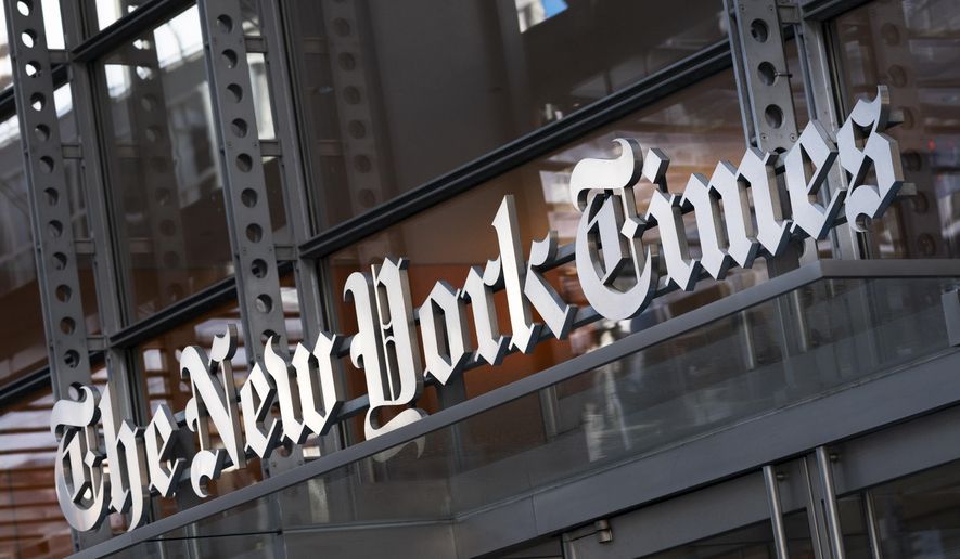 A sign for The New York Times hangs above the entrance to its building, May 6, 2021, in New York. In spring 2024, NBC News, (AP Photo/Mark Lennihan, File)