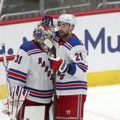 New York Rangers goaltender Igor Shesterkin (31) is embraced by teammate Barclay Goodrow (21) after defeating the Washington Capitals in Game 3 of an NHL hockey Stanley Cup first-round playoff series, Friday, April 26, 2024, in Washington. (AP Photo/Tom Brenner) **FILE**
