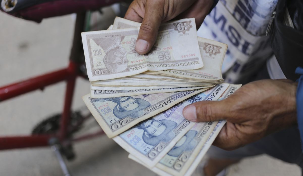 NextImg:Long lines form and frustration grows as Cuba runs short of cash