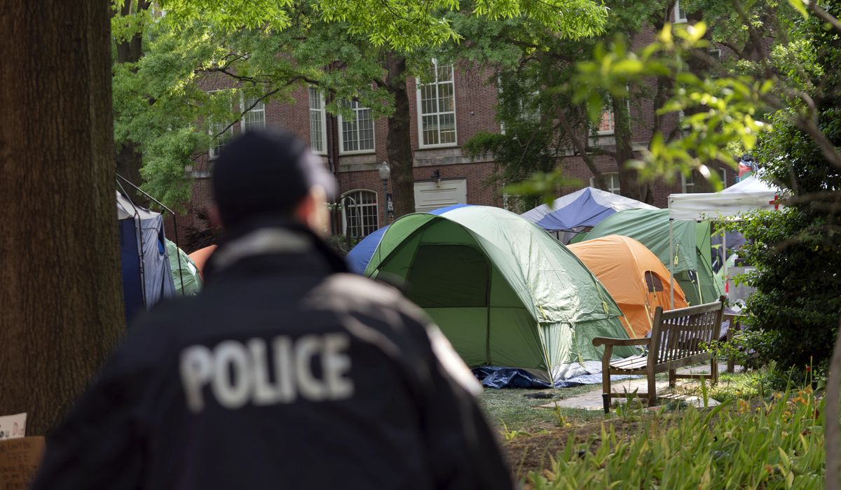 NextImg:Student anti-war protesters dig in as faculty condemn universities’ leadership over calling police