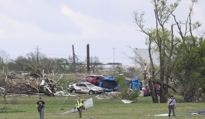 Emergency crews respond after a tornado damaged a Garner Industries facility Friday, April 26, 2024, in Lincoln, Neb. (Nikos Frazier/Omaha World-Herald via AP)