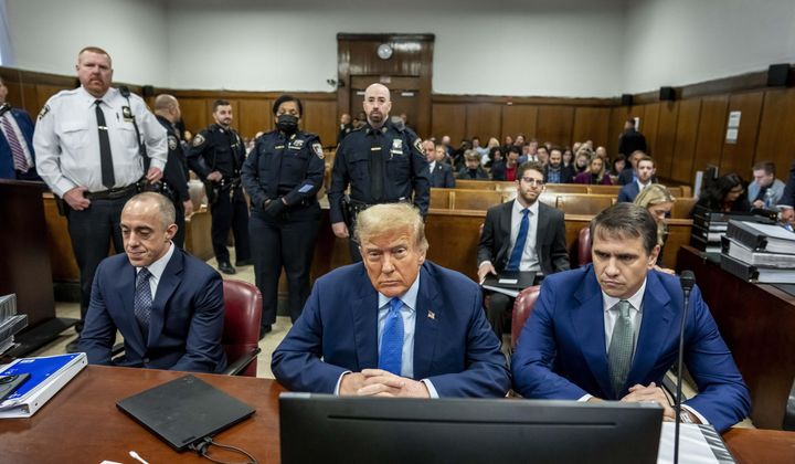 Former President Donald Trump appears at Manhattan criminal court before his trial in New York, Friday, April 26, 2024. (Mark Peterson/Pool Photo via AP)
