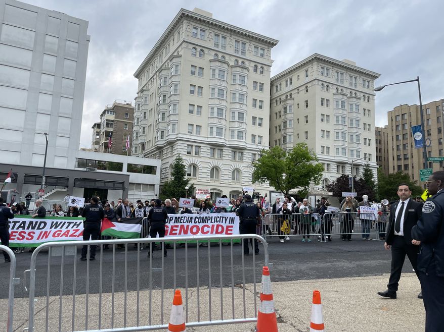 Protesters descended on The Washington Hilton Saturday where President Biden plans to speak at the annual White House Correspondents' Dinner. Photo credit: Kayla Wood / The Washington Times.