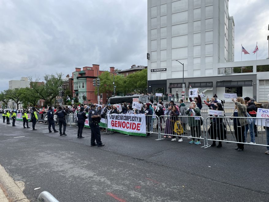 Protesters descended on The Washington Hilton Saturday where President Biden plans to speak at the annual White House Correspondents' Dinner. Photo credit: Kayla Wood / The Washington Times.