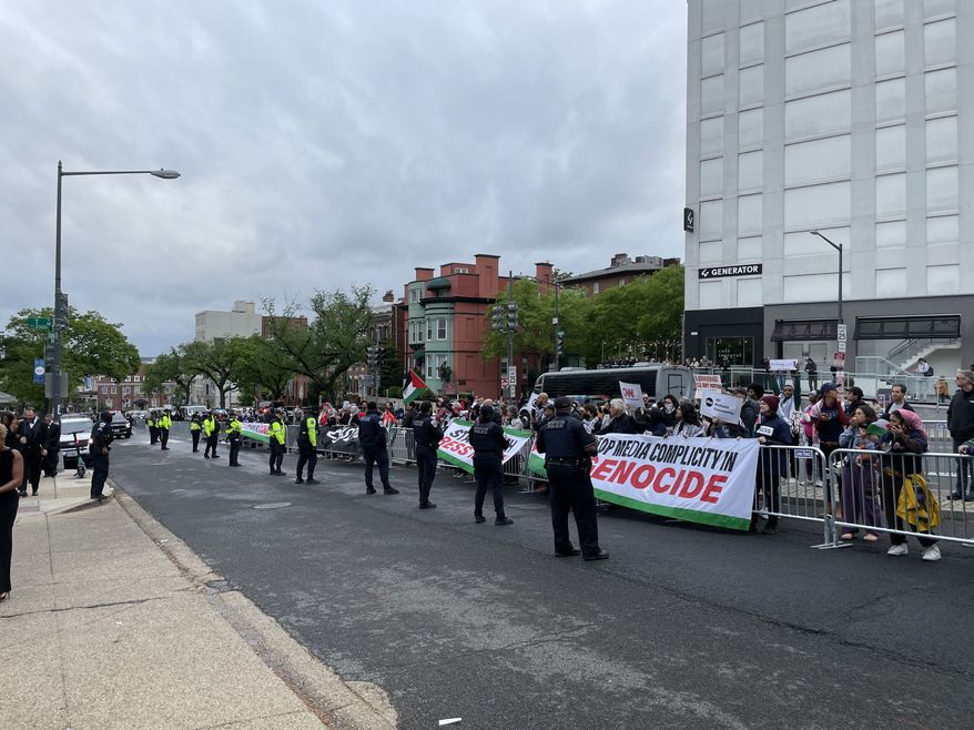 Protesters descended on The Washington Hilton Saturday where President Biden plans to speak at the annual White House Correspondents' Dinner. Photo credit: Kayla Wood / The Washington Times.
