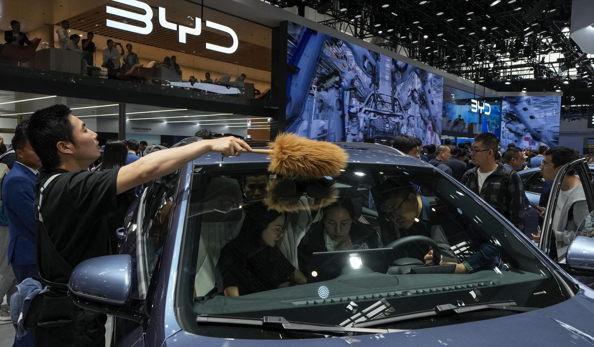NextImg:Tesla founder Musk visits China as competitors show off new electric vehicles at Beijing auto show