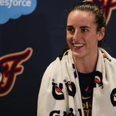 Indiana Fever guard Caitlin Clark speaks with the media after the WNBA basketball team practiced in Indianapolis, Sunday, April 28, 2024. (AP Photo/Michael Conroy)