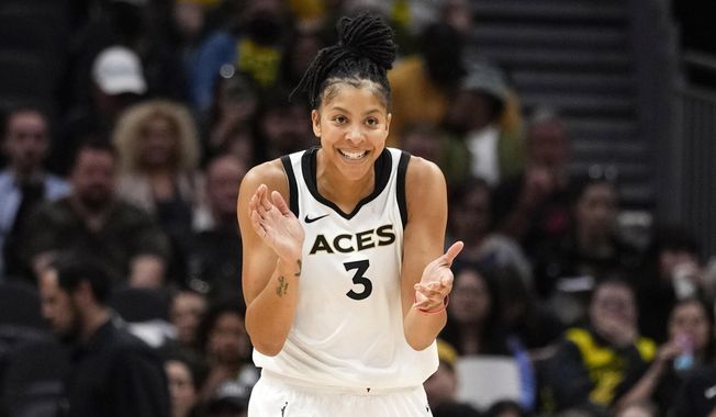 Las Vegas Aces forward Candace Parker reacts during the first half of a WNBA basketball game against the Seattle Storm, May 20, 2023, in Seattle. The three-time WNBA champion has announced she&#x27;s retiring. Parker, a two-time league MVP, announced in a social media post on Sunday, April 28, 2024 that she&#x27;s ending her career after 16 seasons. (AP Photo/Lindsey Wasson, File) **FILE**