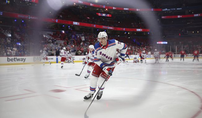 New York Rangers center Matt Rempe warms up in Game 4 of an NHL hockey Stanley Cup first-round playoff series against the Washington Capitals, Sunday, April 28, 2024, in Washington. (AP Photo/Tom Brenner)