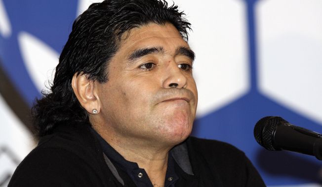 Argentina&#x27;s national soccer team coach Diego Maradona attends a news conference in Caracas, Venezuela, Tuesday, Jan. 27, 2009. A medical examiner&#x27;s report into the death of Maradona injected uncertainty Monday, April 29, 2024, into a case of criminal negligence brought against eight medical workers involved in his care, raising new questions just a month before the staffers are set to stand trial for homicide. (AP Photo/Carlos Hernandez, File)