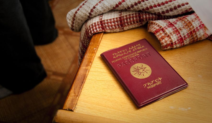 A passport of an Ethiopian fighter pilot on display at a residence, in Tok Mok, Kyrgyzstan, on Monday Aug. 16, 2010. The European Union is tightening visa requirements for people from Ethiopia, it was reported on Monday, April 29, 2024. It says the government there is not cooperating on the deportation of citizens found to be living illegally in the bloc. (AP Photo/Dalton Bennett, File)