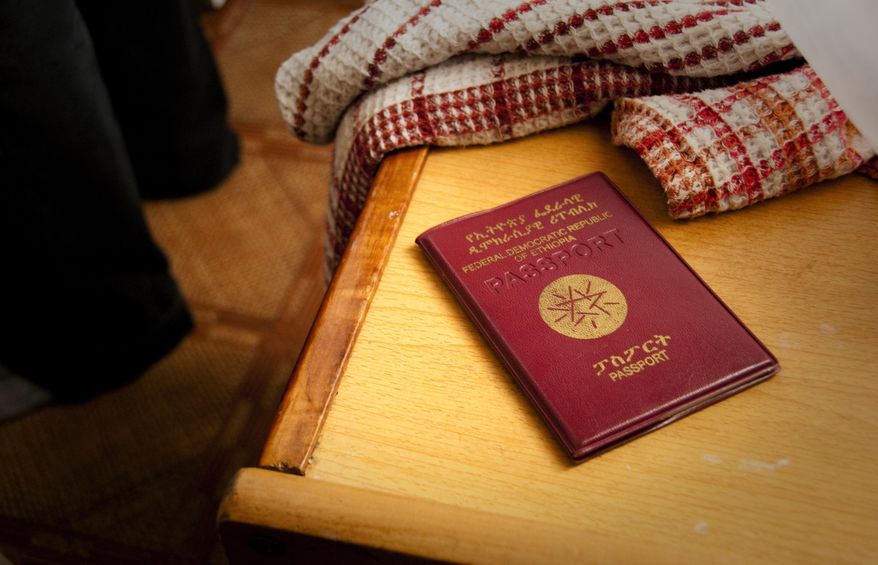 A passport of an Ethiopian fighter pilot on display at a residence, in Tok Mok, Kyrgyzstan, on Monday Aug. 16, 2010. The European Union is tightening visa requirements for people from Ethiopia, it was reported on Monday, April 29, 2024. It says the government there is not cooperating on the deportation of citizens found to be living illegally in the bloc. (AP Photo/Dalton Bennett, File)