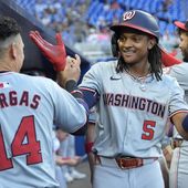 Washington Nationals&#x27; CJ Abrams (5) is congratulated by Ildemaro Vargas (14) after hitting a two-run home run during the third inning of a baseball game against the Miami Marlins, Monday, April 29, 2024, in Miami. (AP Photo/Lynne Sladky)