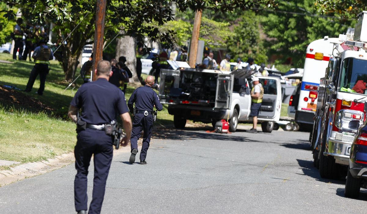 NextImg:Biden to meet with families of officers killed in Charlotte, N.C., shooting