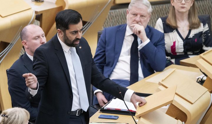 Scotland&#x27;s First Minister Humza Yousaf speaks during First Minster&#x27;s Questions at the Scottish Parliament in Holyrood, Edinburgh, April 25, 2024. Scotland’s first minister, Humza Yousaf, has resigned on Monday, April 29, 2024, rather than face a no-confidence vote just days after he torpedoed a coalition with the Green Party by ditching a target for fighting climate change. (Lesley Martin/PA via AP) **FILE**