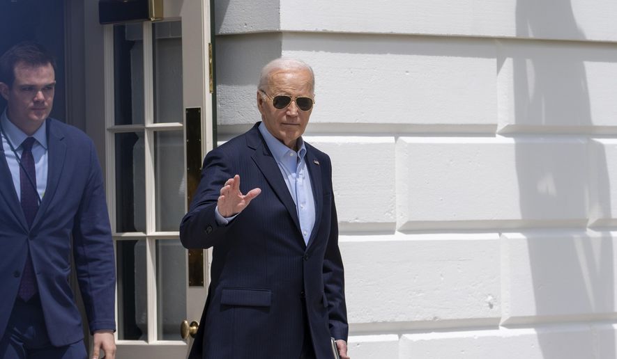 President Joe Biden waves as he walks to Marine One for departure from the South Lawn of the White House, Tuesday, April 30, 2024, in Washington. Biden is headed to Delaware. (AP Photo/Alex Brandon)