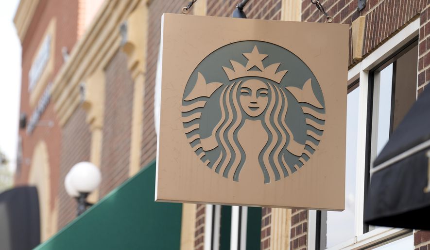 Starbucks sign hangs along Main Street Wednesday, Sept. 20, 2023, in Deadwood, S.D. Four Starbucks in Ashburn, Virginia, were vandalized overnight with anti-Israel, pro-Palestinian graffiti, according to the Loudoun County Sheriff's Department. (AP Photo/David Zalubowski)