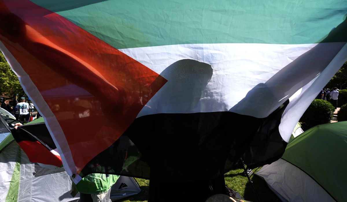 NextImg:Anti-Israel college camp adds reparations, defunding police to demands