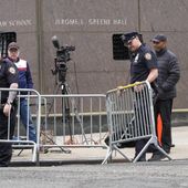 New York City Police officers set up barricades around gathered members of the press outside the Columbia University campus, Tuesday, April 30, 2024, in New York. (AP Photo/Mary Altaffer)