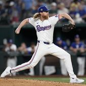 Texas Rangers starting pitcher Jon Gray throws to the Washington Nationals in the seventh inning of a baseball game in Arlington, Texas, Tuesday, April 30, 2024. (AP Photo/Tony Gutierrez)