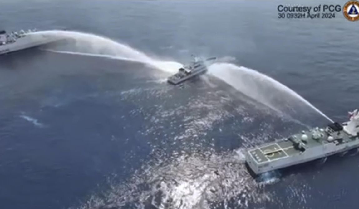 In this image made from video provided by the Philippine Coast Guard, Philippine Coast Guard vessel, BRP BAGACAY (MRRV-4410) is water cannoned by Chinese Coast Guards as it tried to approach the waters near Scarborough Shoal locally known as Bajo De Masinloc at the South China Sea on Tuesday April 30, 2024. (Philippine Coast Guard via AP)