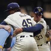 Milwaukee Brewers&#x27; Abner Uribe (45) is held back by Quintin Berry (33) as he fights with Tampa Bay Rays&#x27; Jose Siri (22) during the eighth inning of a baseball game Tuesday, April 30, 2024, in Milwaukee. (AP Photo/Aaron Gash) **FILE**