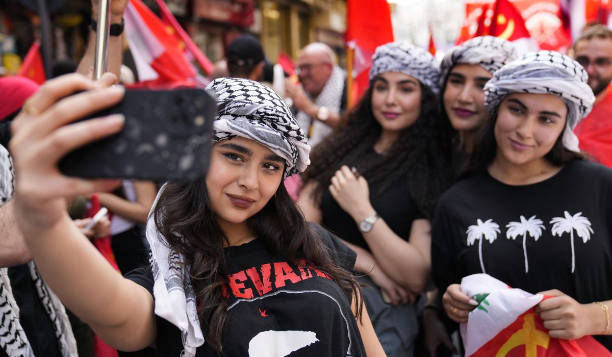 NextImg:Workers and activists around the world hold May Day rallies urging greater rights and more pay
