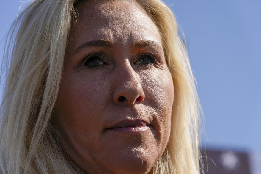 Rep. Marjorie Taylor Greene, R-Ga., says she'll call a vote next week on ousting House Speaker Mike Johnson, R-La., during a news conference at the Capitol in Washington, Wednesday, May 1, 2024. Rep. Greene, a staunch ally of former President Donald Trump, is forcing her colleagues to choose sides after Democratic leaders announced they'd provide the votes to save the Republican speaker's job. (AP Photo/J. Scott Applewhite)