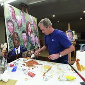 This photo provided by the George W. Bush Presidential Center shows former President George W. Bush working on a portrait of service members and veterans. The George W. Bush Institute is loaning the 60 color portraits by the former U.S. president to Walt Disney World. The paintings of service members and veterans will be on display for a year starting next month at Epcot&#x27;s American Adventure pavilion. (Courtesy of the George W. Bush Presidential Center via AP)