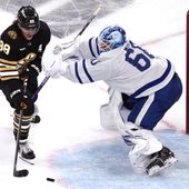 Toronto Maple Leafs goaltender Joseph Woll (60) checks Boston Bruins right wing David Pastrnak (88) on a shot during the third period of Game 5 of an NHL hockey Stanley Cup first-round playoff series, Tuesday, April 30, 2024, in Boston. (AP Photo/Charles Krupa) **FILE**