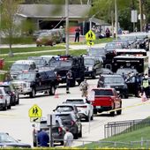 Law enforcement personnel respond to a report of a person armed with a rifle at Mount Horeb Middle School in Mount Horeb, Wis., Wednesday, May 1, 2024. The school district said a person it described as an active shooter was outside a middle school in Mount Horeb on Wednesday but the threat was “neutralized” and no one inside the building was injured. (John Hart/Wisconsin State Journal via AP)