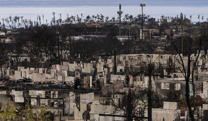 A general view shows the aftermath of a wildfire in Lahaina, Hawaii, Monday, Aug. 21, 2023. The wildfires devastated parts of the Hawaiian island of Maui earlier this month. Maui County is suing major cellular carriers for failing to properly inform police of widespread service outages during the height of last summer&#x27;s deadly wildfire. (AP Photo/Jae C. Hong, File)