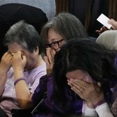 Bereaved family members of the victims of the Halloween crush in 2022 react at the National Assembly in Seoul, South Korea, Thursday, May 2, 2024. South Korea&#x27;s parliament on Thursday approved legislation mandating a new, independent investigation into the 2022 Halloween crush in Seoul that killed 159 people. (AP Photo/Ahn Young-joon)