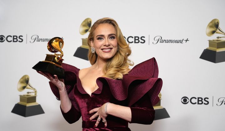 Adele, winner of the award for best pop solo performance for &quot;Easy on Me,&quot; poses in the press room at the 65th annual Grammy Awards on Feb. 5, 2023, in Los Angeles. Artists from Universal Music Group, which include Drake, Adele, Bad Bunny and Billie Eilish, will be returning to TikTok as the two parties have struck a new licensing agreement following an approximately three-month-long dispute. (AP Photo/Jae C. Hong, File)