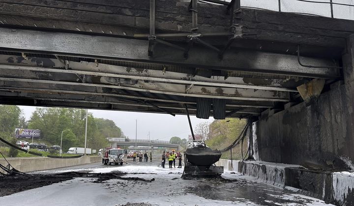 In this image provided by the Connecticut Governor&#x27;s Office, emergency personnel work at the scene of a fiery early morning crash that left both sides of Interstate 95, the East Coast’s main north-south highway, shut down in southwestern Connecticut., Thursday, May 2, 2024, in Norwalk, Conn. (Norwalk Fire Department/Connecticut Governor&#x27;s Office via AP)