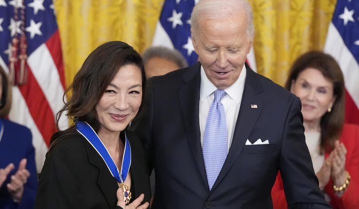 President Joe Biden awards the nation&#x27;s highest civilian honor, the Presidential Medal of Freedom, to Michelle Yeoh during a ceremony in the East Room of the White House, Friday, May 3, 2024, in Washington. (AP Photo/Alex Brandon)