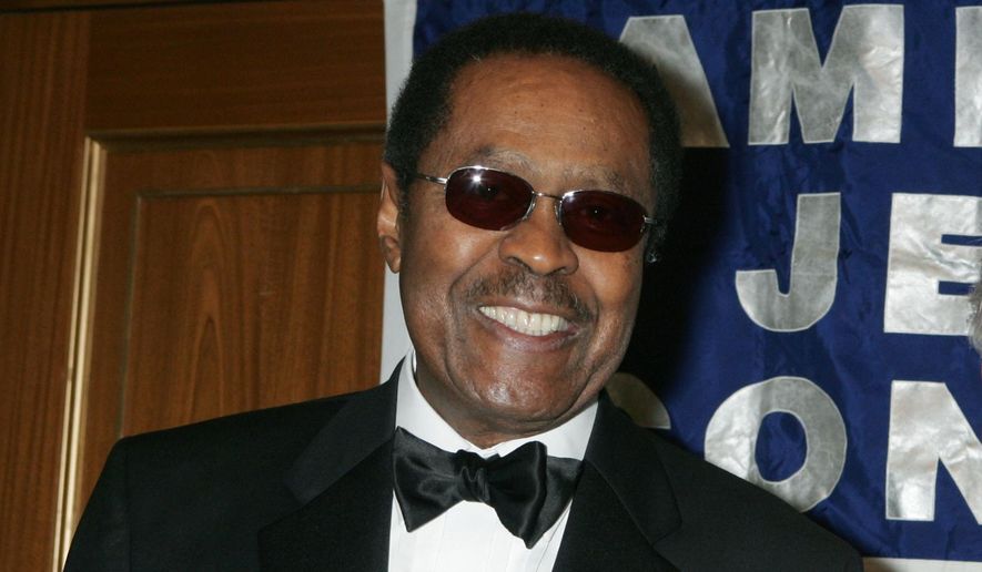 Clarence B. Jones poses for a photo before was presented with the American Jewish Congress' "Isaiah Award," March 1, 2006, in New York. (AP Photo/Diane Bondareff, File)
