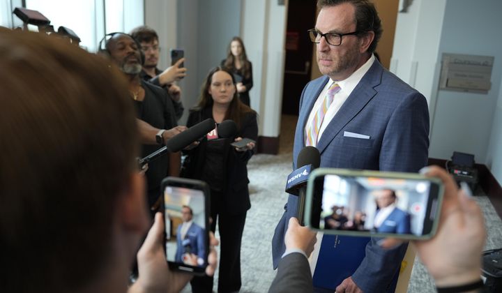 Attorney Worrick Robinson, who represents Country music artist Morgan Wallen, speaks to reporters after a court hearing Friday, May 3, 2024, in Nashville, Tenn. Wallen waived his right to appear at the hearing following his April arrest on three felony counts of reckless endangerment and one misdemeanor count of disorderly conduct for throwing a chair off the roof of a downtown bar. (AP Photo/George Walker IV via Pool)
